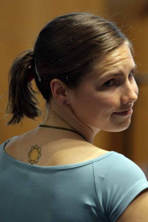 PERUGIA, ITALY - JUNE 19: Amanda Knox attends a session of the Meredith Kercher murder trial at the Perugia courthouse on June 19, 2009 in Perugia, Italy. Amanda Knox and her former Italian boyfriend Raffaele Sollecito have been charged with the murder of British student Meredith Kercher on November 1, 2007 in Italy. (Photo by Franco Origlia/Getty Images) *** Local Caption *** Amanda Knox