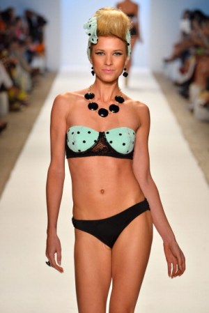 MIAMI, FL - JULY 20: A model walks the runway at the Nicolita show during Mercedes-Benz Fashion Week Swim 2014 at Oasis at the Raleigh on July 20, 2013 in Miami, Florida. (Photo by Frazer Harrison/Getty Images for Mercedes-Benz Fashion Week Swim 2014)