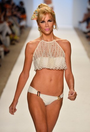 MIAMI, FL - JULY 20: A model walks the runway at the Nicolita show during Mercedes-Benz Fashion Week Swim 2014 at Oasis at the Raleigh on July 20, 2013 in Miami, Florida. (Photo by Frazer Harrison/Getty Images for Mercedes-Benz Fashion Week Swim 2014)