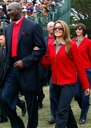 Prieto y Jordan juntos en una competencia de golf en octubre de 2009.