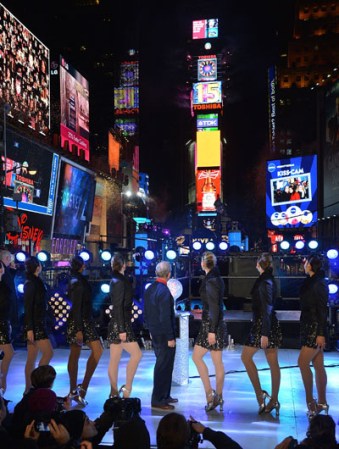 NEW YORK, NY - DECEMBER 31: New York City Mayor Michael Bloomberg (C) celebrates New Year's Eve 2013 In Times Square with the Rockettes at Times Square on December 31, 2012 in New York City. (Photo by Mike Coppola/Getty Images)
