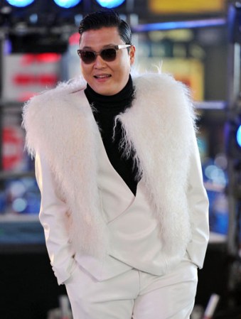 NEW YORK, NY - DECEMBER 31: Korean Rapper PSY performs during New Year's Eve 2013 In Times Square at Times Square on December 31, 2012 in New York City. (Photo by Mike Coppola/Getty Images)
