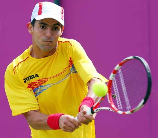 DIA 1: Santiago Giraldo, de Colombia, juega contra Ryan Harrison de Estados Unidos durante los partidos de tenis varonil.