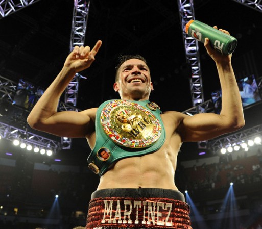 LAS VEGAS, NV - SEPTEMBER 15: Sergio Martinez celebrates after defeating Julio Cesar Chavez Jr. in twelve rounds by unanimous decision for their WBC middleweight title fight at the Thomas & Mack Center on September 15, 2012 in Las Vegas, Nevada. (Photo by Jeff Bottari/Getty Images)