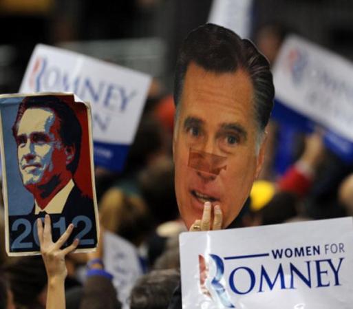 Carteles a favor de Romney durante el acto llevado a cabo en Manchester.