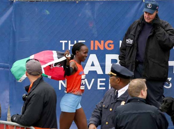 NEW YORK, NY - NOVEMBER 03: Priscah Jeptoo of Kenya celebrates after she won the 2013 ING New York City Marathon on November 3, 2013 in New York City. (Photo by Elsa/Getty Images)