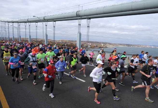NEW YORK, NY - NOVEMBER 03: Runners cross the Verrazano-Narrows Bridge at the start of the ING New York City Marathon on November 3, 2013 in the Brooklyn borough of New York City. (Photo by Maddie Meyer/Getty Images)