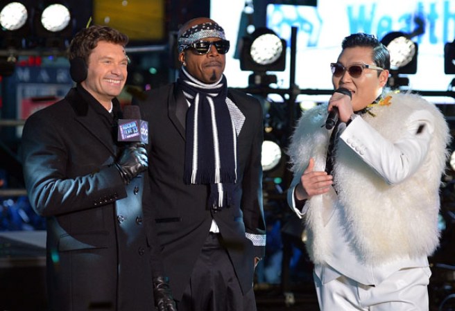 NEW YORK, NY - DECEMBER 31: (L-R) Media personality Ryan Seacrest, rapper MC Hammer (L), and Korean rapper PSY perform during New Year's Eve 2013 In Times Square at Times Square on December 31, 2012 in New York City. (Photo by Mike Coppola/Getty Images)
