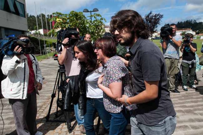 SANTIAGO DE COMPOSTELA, SPAIN - JULY 25: Relatives of passengers involved in the train crash wait for news at the Cersia Building on July 25, 2013 in Santiago de Compostela, Spain. The crash occurred as the train approached the north-western Spanish city of Santiago de Compostela at 8.40pm on July 24th, at least 77 people have died and a further 131 reported injured. The crash occured on the eve of the Santiago de Compostela Festivities. (Photo by David Ramos/Getty Images)