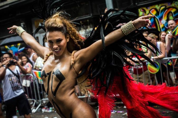 NEW YORK, NY - JUNE 30: Revelers march in the New York Gay Pride Parade on June 30, 2013 in New York City. This year's parade was a particularly festive occasion, due to the recent Supreme Court Ruling that it was unconstitutional to ban gay marriage. (Photo by Andrew Burton/Getty Images)