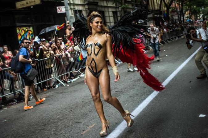 NEW YORK, NY - JUNE 30: Revelers march in the New York Gay Pride Parade on June 30, 2013 in New York City. This year's parade was a particularly festive occasion, due to the recent Supreme Court Ruling that it was unconstitutional to ban gay marriage. (Photo by Andrew Burton/Getty Images)