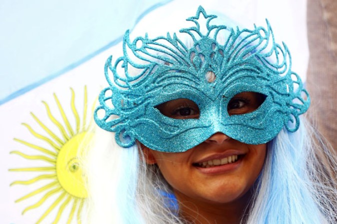 SAO PAULO, BRAZIL - JULY 09: An Argentina fan enjoys the atmosphere prior to the 2014 FIFA World Cup Brazil Semi Final match between the Netherlands and Argentina at Arena de Sao Paulo on July 9, 2014 in Sao Paulo, Brazil. (Photo by Jamie Squire/Getty Images)