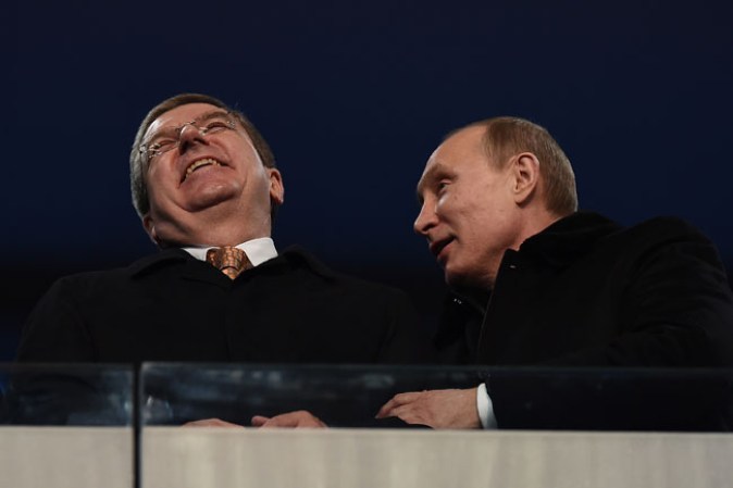 El presidente ruso, Vladímir Putin (derecha), encargado de declarar abiertos los Juegos.