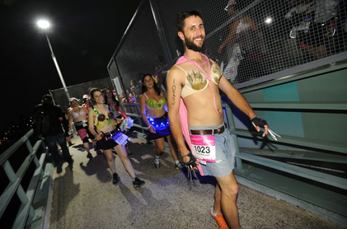 NEW YORK, NY - JULY 20: Participants attend the first-ever MoonWalk NYC at Randall's Island on July 20, 2013 in New York City. (Photo by Bryan Bedder/Getty Images for Walk the Walk)