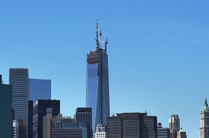 NEW YORK, NY - MAY 02: The 408-foot spire can be seen from the Brooklyn Promenade after it was hoisted onto a temporary platform on the top of One World Trade Center on May 2, 2013 in New York City. When bolted into place at a later date, the spire will make One World Trade Center the tallest building in the Western Hemisphere.The raising of the spire, which comes on the second anniversary of the death of Osama bin Laden, will make One World Trade Center 1,776 feet tall. One World Trade Center is built on the site where the September 11, 2001 attacks toppled the original World Trade Center towers. (Photo by Spencer Platt/Getty Images)