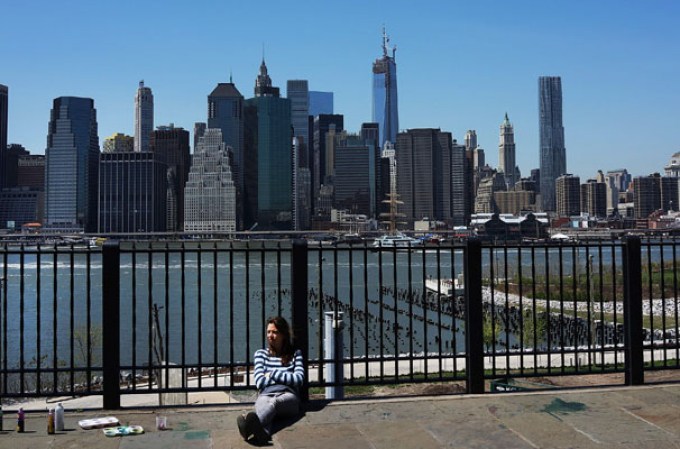 NEW YORK, NY - MAY 02: The 408-foot spire can be seen from the Brooklyn Promenade after it was hoisted onto a temporary platform on the top of One World Trade Center on May 2, 2013 in New York City. When bolted into place at a later date, the spire will make One World Trade Center the tallest building in the Western Hemisphere.The raising of the spire, which comes on the second anniversary of the death of Osama bin Laden, will make One World Trade Center 1,776 feet tall. One World Trade Center is built on the site where the September 11, 2001 attacks toppled the original World Trade Center towers. (Photo by Spencer Platt/Getty Images)