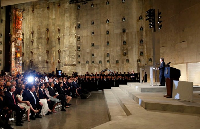 NEW YORK, NY - MAY 15: Former New York City Mayor Michael Bloomberg speaks during the opening ceremony for the National September 11 Memorial Museum at ground zero May 15, 2014 in New York City. The museum spans seven stories, mostly underground, and contains artifacts from the attack on the World Trade Center Towers on September 11, 2001 that include the 80 ft high tridents, the so-called "Ground Zero Cross," the destroyed remains of Company 21's New York Fire Department Engine as well as smaller items such as letter that fell from a hijacked plane and posters of missing loved ones projected onto the wall of the museum. The museum will open to the public on May 21. (Photo by Mike Segar-Pool/Getty Images)