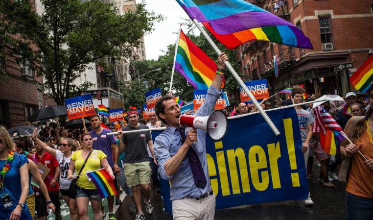 NEW YORK, NY - JUNE 30: New York City mayoral candidate Anthony Weiner marches in the New York Gay Pride Parade on June 30, 2013 in New York City. This year's parade was a particularly festive occasion, due to the recent Supreme Court Ruling that it was unconstitutional to ban gay marriage. (Photo by Andrew Burton/Getty Images)