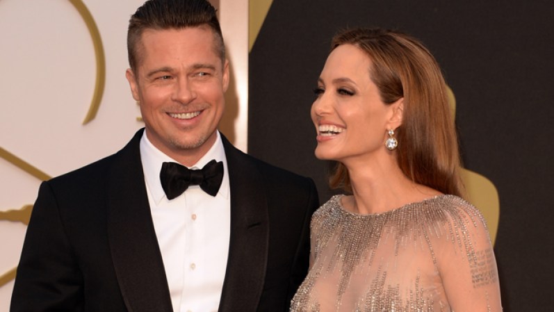 Vea los vestidos y trajes que lucieron las celebridades en la alfombra roja durante los Premios Oscar 2014. Actores Brad Pitt (izquierda) y Angelina Jolie