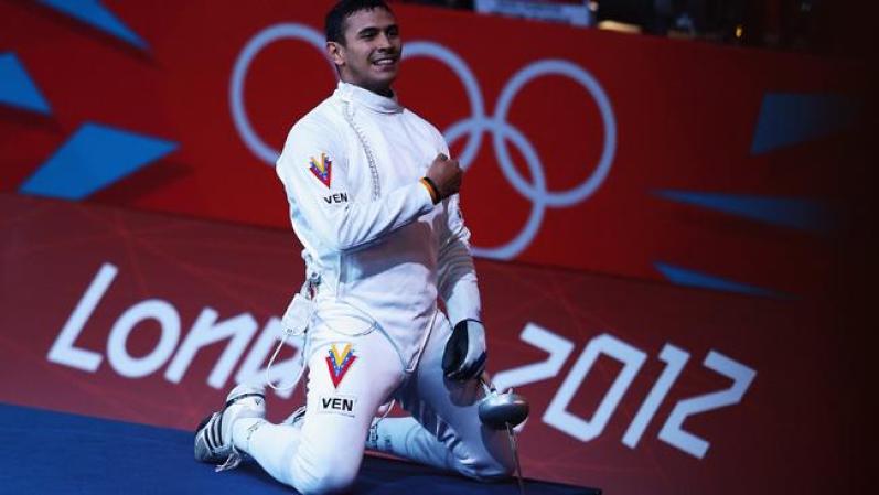 LONDON, ENGLAND - AUGUST 01: Ruben Limardo Gascon of Venezuela celebrates after beating Max Heinzer of Switzerland in the Men's Individual Epee round of 16 match on Day 5 of the London 2012 Olympic Games at ExCeL on August 1, 2012 in London, England. (Photo by Hannah Johnston/Getty Images)