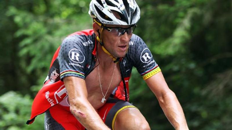 STATION DES ROUSSES, FRANCE - JULY 10: Lance Armstrong of the USA and Team Radioshack rides on stage seven of the 2010 Tour de France from Tournus to Station des Rousses on July 10, 2010 in Station des Rousses, France. (Photo by Bryn Lennon/Getty Images) *** Local Caption *** Lance Armstrong
