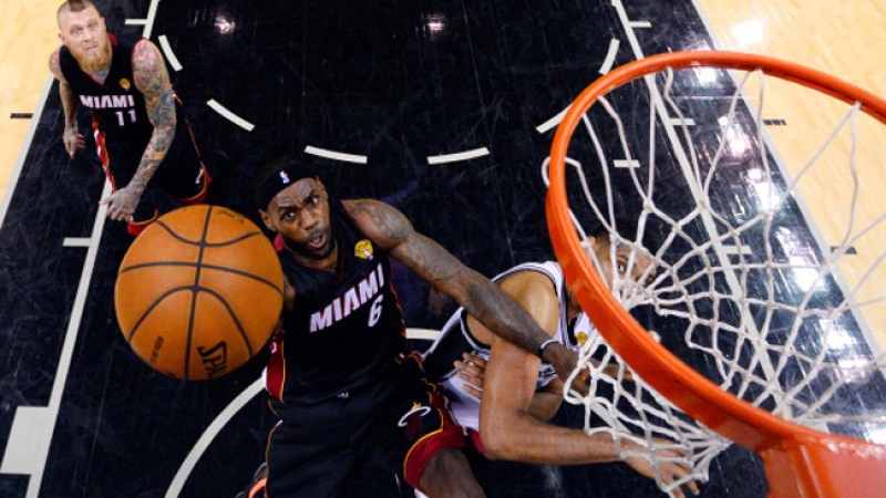 SAN ANTONIO, TX - JUNE 08: LeBron James #6 of the Miami Heat goes to the basket against the San Antonio Spurs during Game Two of the 2014 NBA Finals at the AT&T Center on June 8, 2014 in San Antonio, Texas. NOTE TO USER: User expressly acknowledges and agrees that, by downloading and or using this photograph, User is consenting to the terms and conditions of the Getty Images License Agreement. (Photo by Larry W. Smith - Pool/Getty Images)