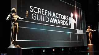 In this Jan. 19, 2020, file photo, SAG award statues are seen on stage as final preparations are made at the Shrine Auditorium for the 26th annual Screen Actors Guild Awards in Los Angeles. The SAG Awards will be broadcast live on TNT and TBS.