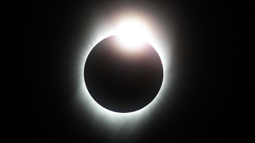 A total eclipse with the ‘diamond ring’ effect is seen from South Mike Sedar Park on Aug. 21, 2017, in Casper, Wyoming.  Millions of people flocked to areas of the U.S. that are in the “path of totality” in order to experience a total solar eclipse. During the event, the moon passed in between the sun and the Earth, appearing to block the sun.