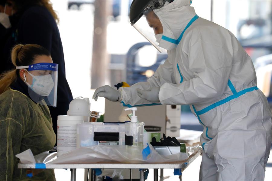 Another NJ city imposes virus curfew as US breaks daily case record for third time this week