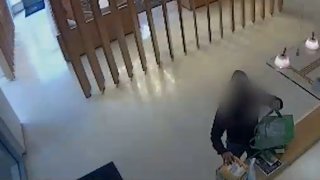 Surveillance video appears to show a man stealing a package containing the ashes of a D.C. man's mother.