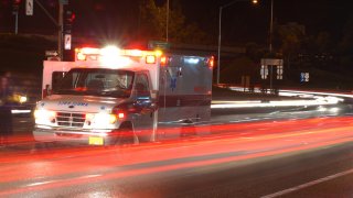 ambulance-highway-night-shutterstock_403809551