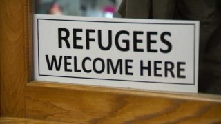 refugee sign