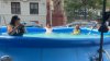 Fiesta en piscina inflable en pleno Washington Heights moviliza al NYPD