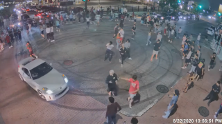 Flash mob of people and vehicles