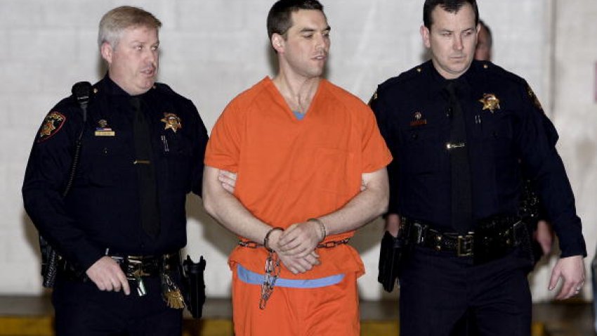 Convicted murderer Scott Peterson is escorted by two San Mateo County Sheriff deputies as he is walked from the jail to an awaiting van March 17, 2005 in Redwood City, California. Scott Peterson was transported to San Quentin Prison death row after he was formally sentenced to death for the murder or his wife Laci and their unborn son. (Photo by Justin Sullivan/Getty Images)