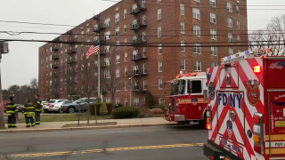 A woman was found dead inside the garbage chute of a Staten Island apartment building, police said Saturday