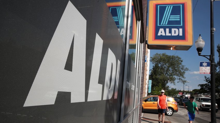 A sign hangs outside an Aldi grocery store in Chicago, Illinois.