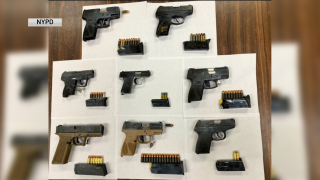 Police in Brooklyn recovered at least eight firearms from a party bus celebrating an 18th birthday, sources said
