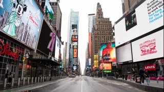 Times Square sits emptied of its usual crowds on May 23, 2020, in New York. Bustling metropolises in countries around the world sat empty as government leaders shut down the tourism and local hospitality in an effort to mitigate the spread of COVID-19.
