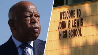 John Lewis and a sign for John Lewis High school in Virginia