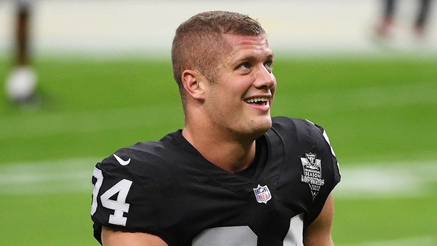 LAS VEGAS, NEVADA – NOVEMBER 15: Carl Nassib #94 of the Las Vegas Raiders flexes while smiling during warmups before a game against the Denver Broncos at Allegiant Stadium on November 15, 2020 in Las Vegas, Nevada. (Photo by Ethan Miller/Getty Images)