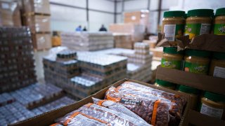 Food items wait to be packaged and distributed at Feeding America food bank in Elizabethtown, Ky