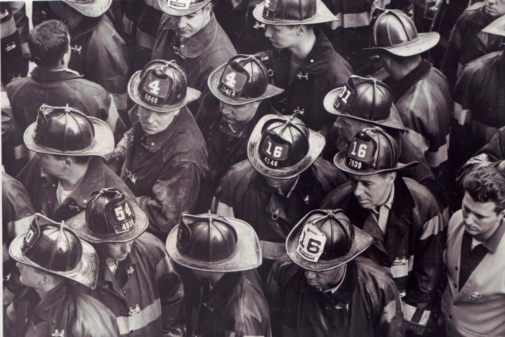 FDNY firemen wait during search for victims of 1966 fire in Manhattan