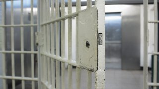 Open door to prison cell