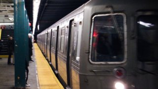 An MTA train arrives at Clinton Washington station. Seen from the platform.