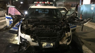 NYPD patrol vehicle destroyed after a man set fire to the car.