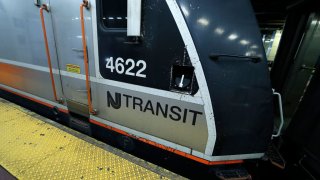 An NJ Transit train stands in Penn station