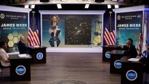 WASHINGTON, DC - JULY 11: U.S. President Joe Biden, Vice President Kamala Harris, NASA Administrator Bill Nelson and others look at the first image from the new Webb Space Telescope in the Eisenhower Executive Office Building's South Court Auditorium on July 11, 2022 in Washington, DC. According to NASA, the telescope images are the highest-resolution images of the infrared universe ever captured. (Photo by Chip Somodevilla/Getty Images)