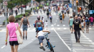 People roam the New York streets freely with a car-free environment