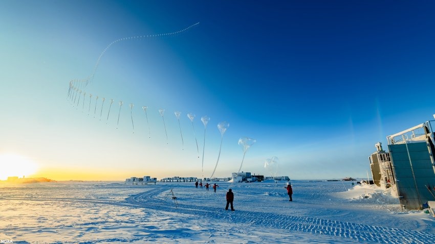 A NOAA ozonesonde — an instrument used to help scientists monitor the Antarctic ozone hole — ascends over the South Pole in this time-lapse photo taken October 21, 2020.